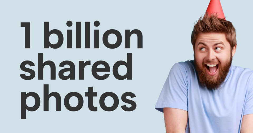 A man with a beard wearing a red party hat and a light blue shirt smiles excitedly next to large text that reads, 1 billion shared photos, on a light blue background.